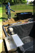 La construction pas � pas du bassin � ko� de mon voisin  5 