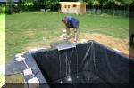 La construction pas � pas du bassin � ko� de mon voisin  26 